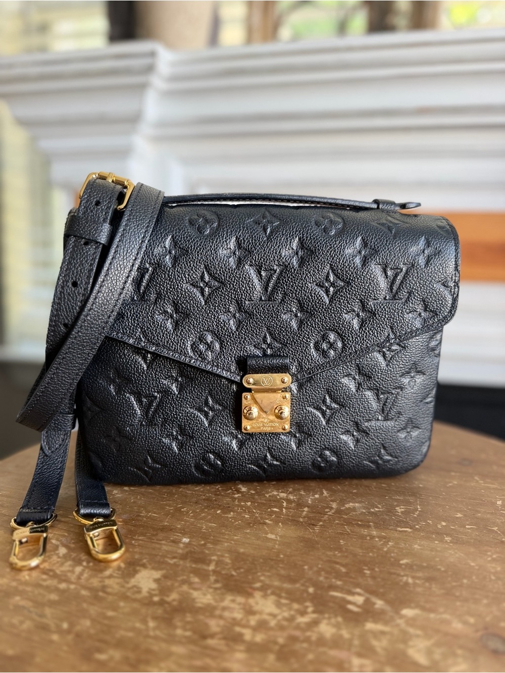 Louis Vuitton Pochette Métis Monogram Empreinte Leather in Black gold hardware